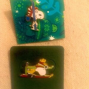 Two Snoopy Skiing Pins excellent like new !